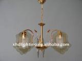 golden home lighting with glass chandelier
