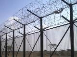 High security fencing - razor barbed wire on welded panels or chain link fence