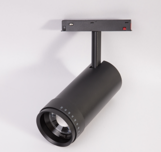 Magnetic zoomable spotlight track light