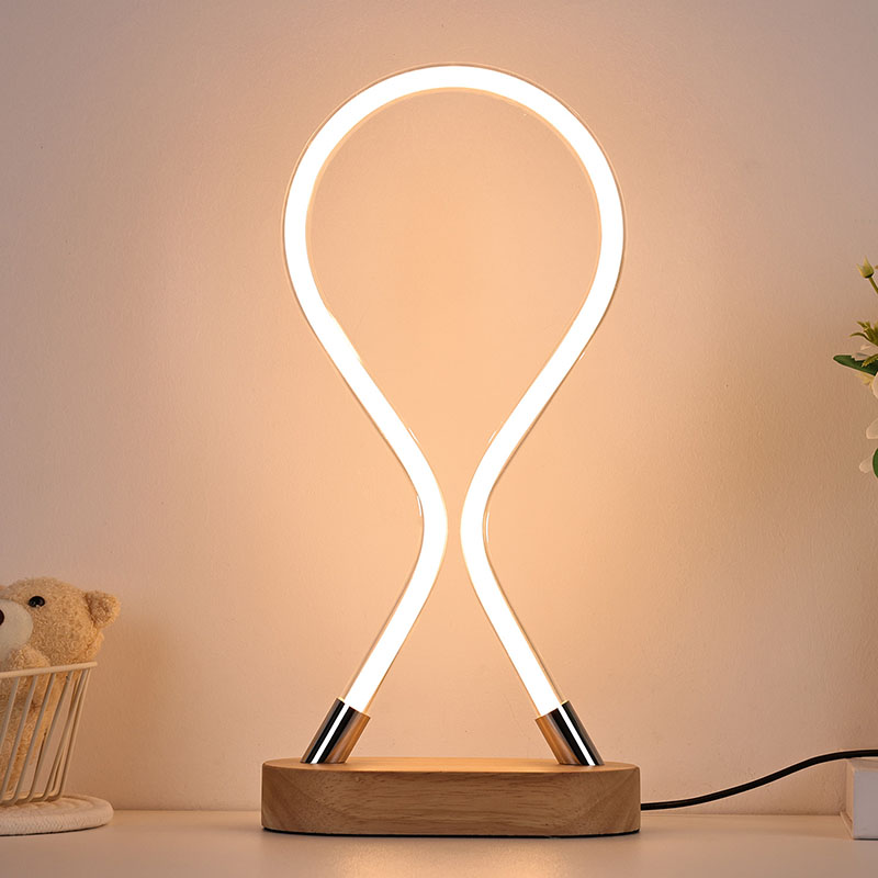 Red ribbon shaped led table lamp